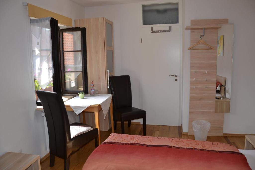 Postel nebo postele na pokoji v ubytování Baumeisterhaus