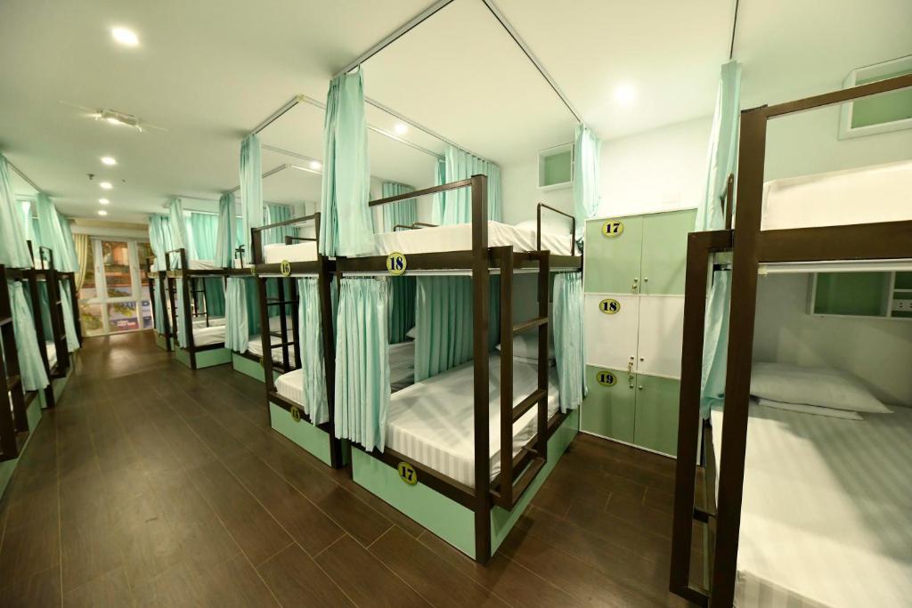 Postel nebo postele na pokoji v ubytování Hanoi Traveller House