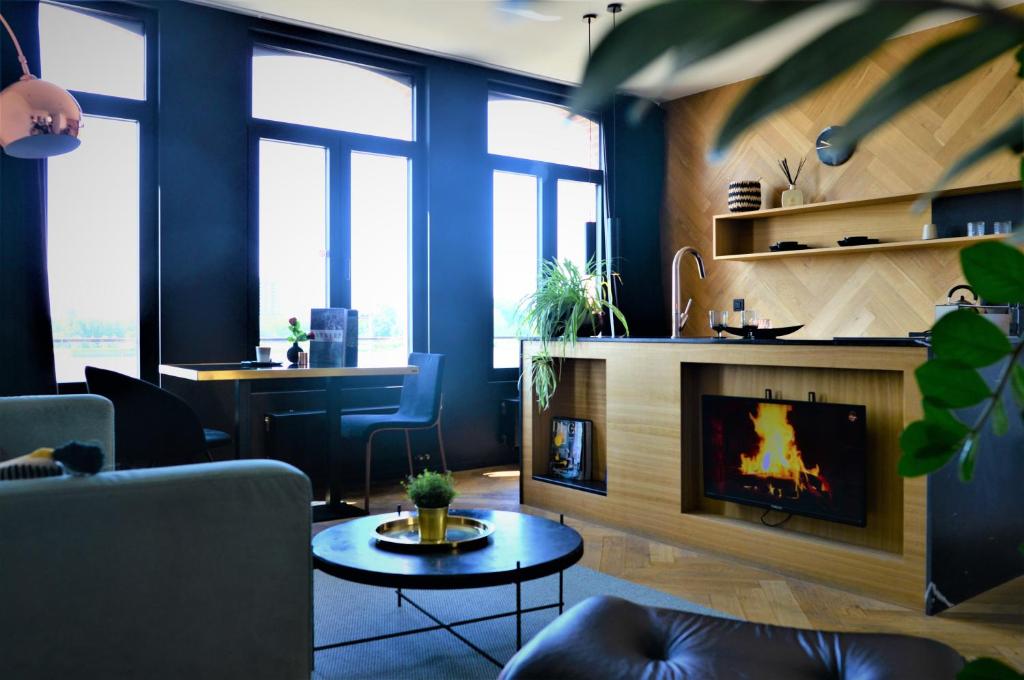 Istumisnurk majutusasutuses Kaai11 - Riverview Lofts & Suites