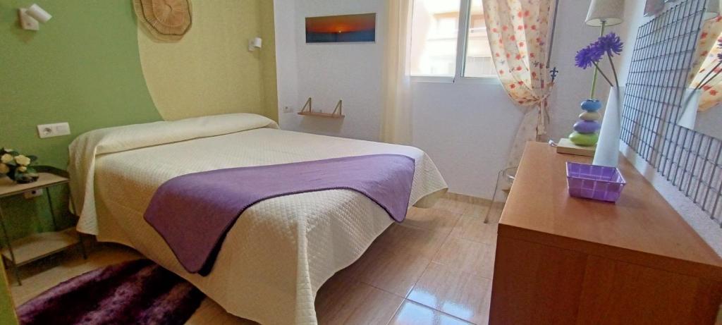 Postel nebo postele na pokoji v ubytování Apartamento la Brisa del Mar