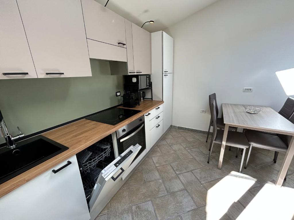 Kuchyň nebo kuchyňský kout v ubytování Appartamento vicino spiaggia