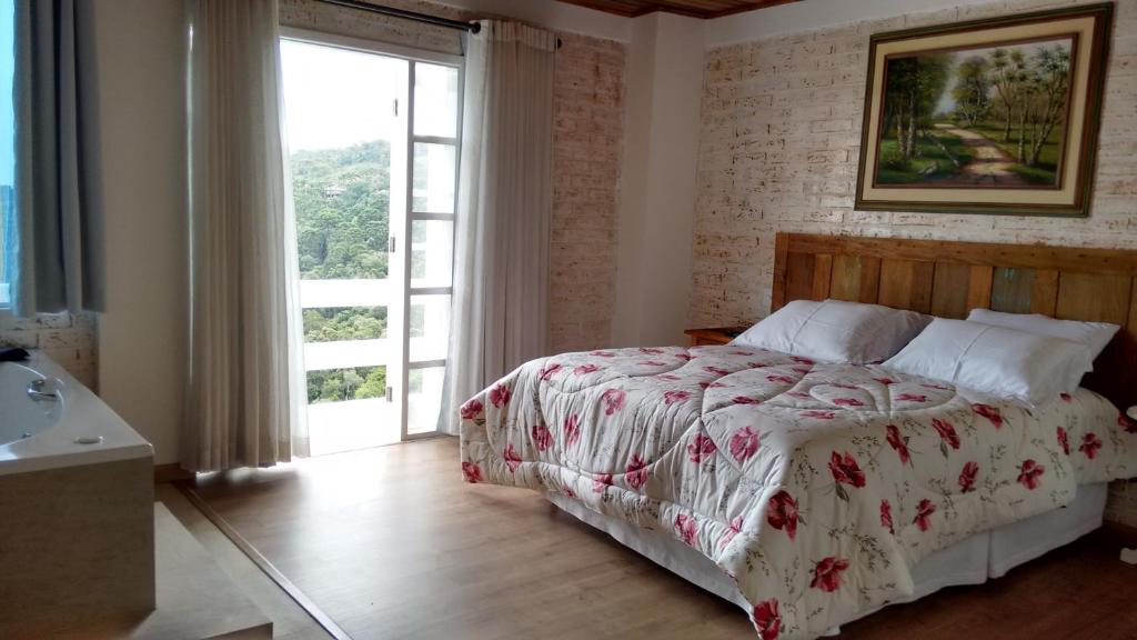 Postel nebo postele na pokoji v ubytování Pousada Casa Pinha