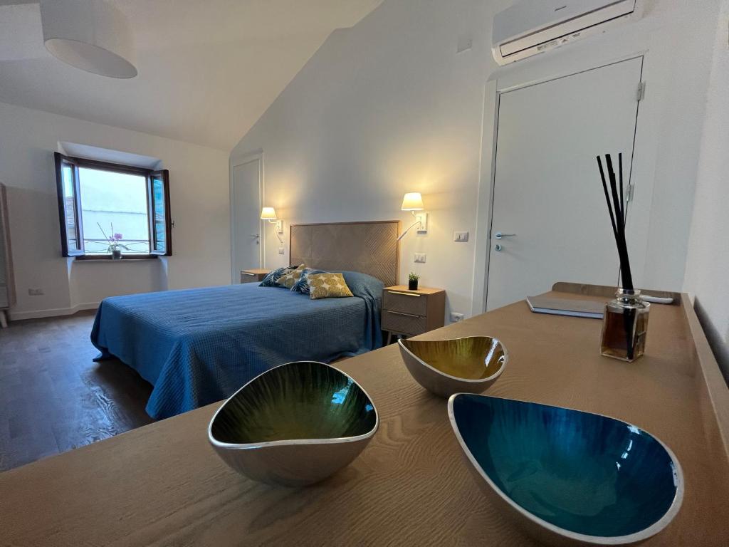 Postel nebo postele na pokoji v ubytování CIVICO 27 rooms