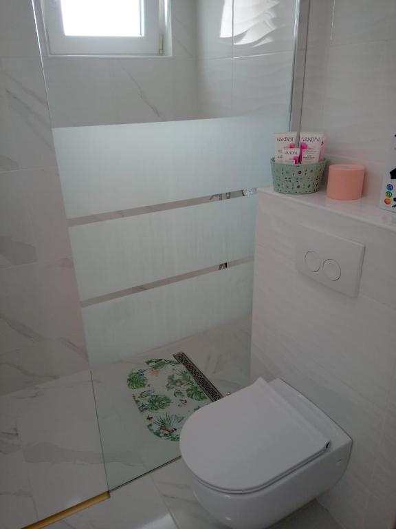 Kúpeľňa v ubytovaní Apartmani Doris
