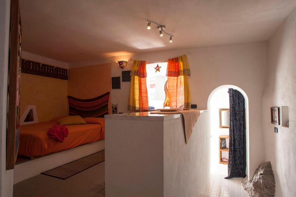 Postel nebo postele na pokoji v ubytování B&B BIANCALUNA
