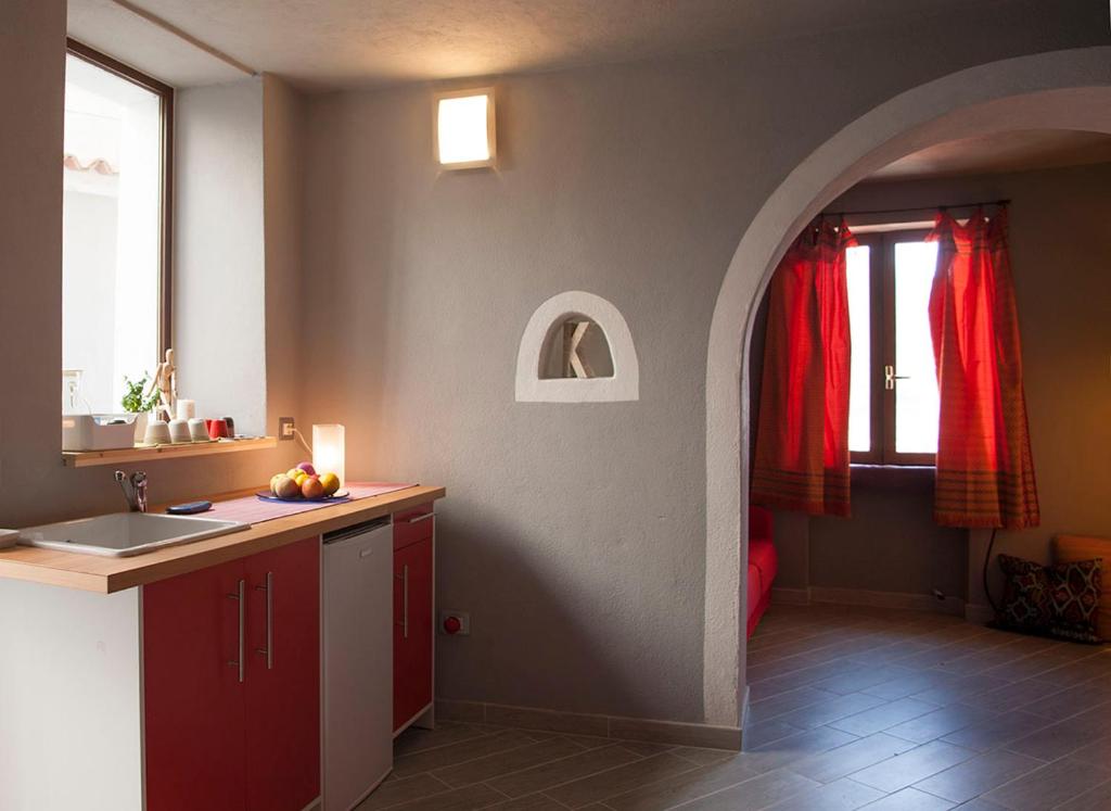 Kuchyň nebo kuchyňský kout v ubytování B&B BIANCALUNA