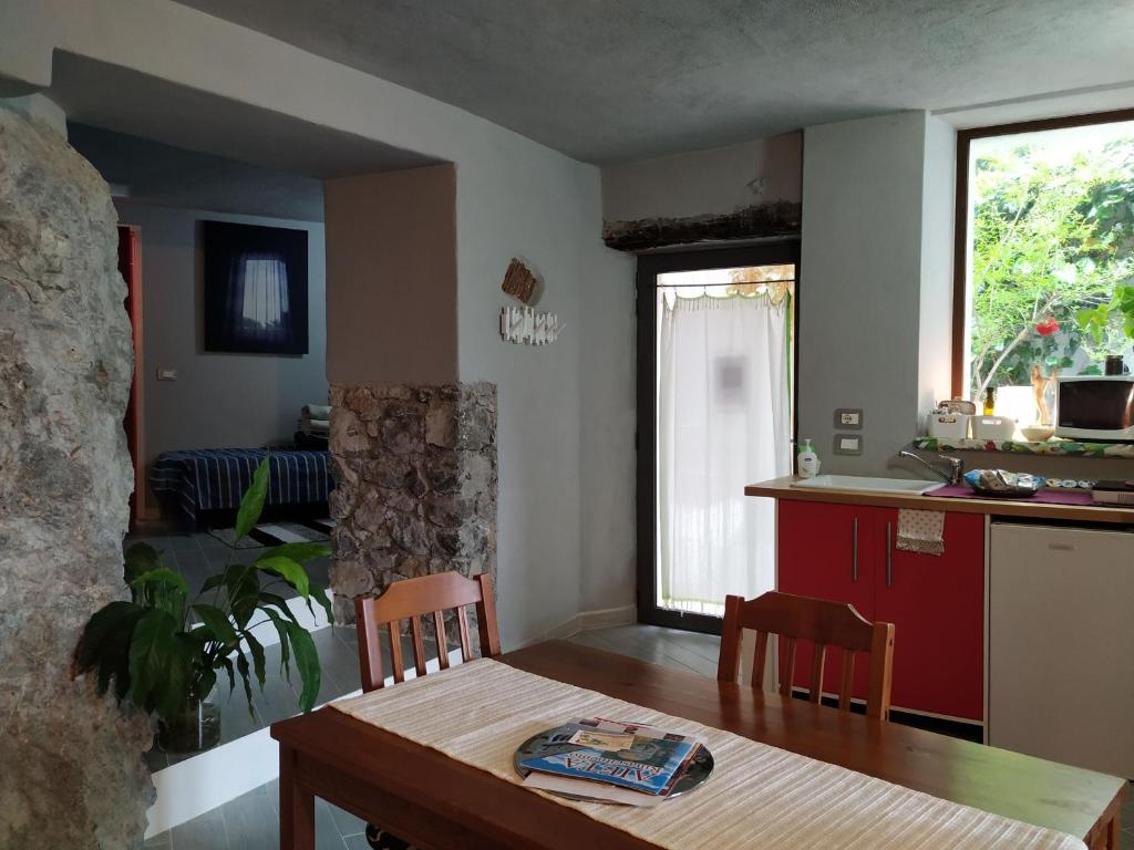 Kuchyň nebo kuchyňský kout v ubytování B&B BIANCALUNA
