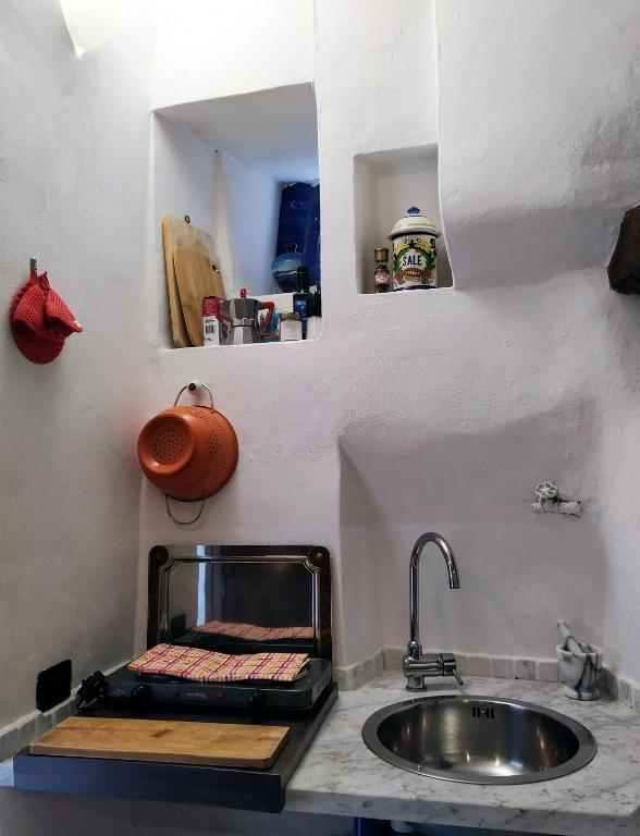 Kuchyň nebo kuchyňský kout v ubytování B&B BIANCALUNA