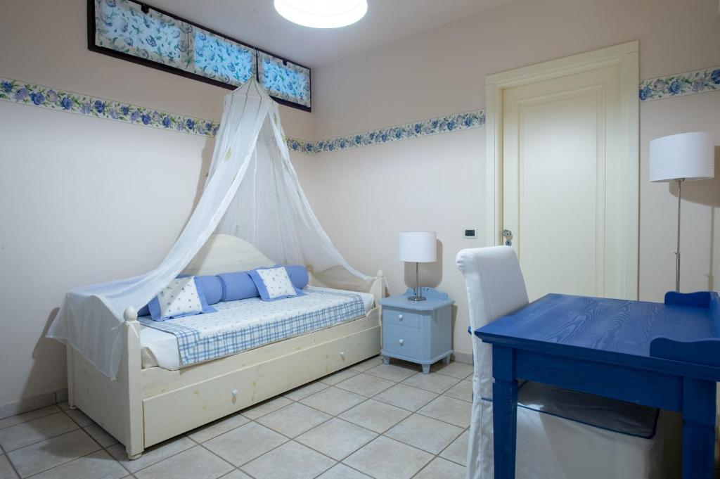 Postel nebo postele na pokoji v ubytování B&B at DurruEli's
