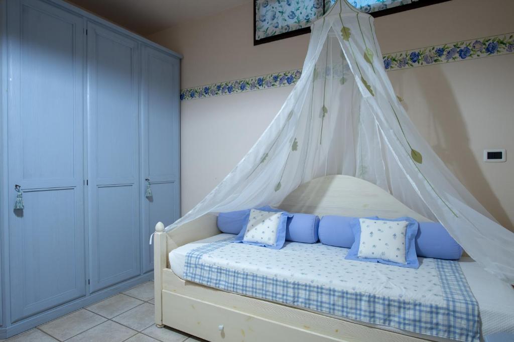 Postel nebo postele na pokoji v ubytování B&B at DurruEli's
