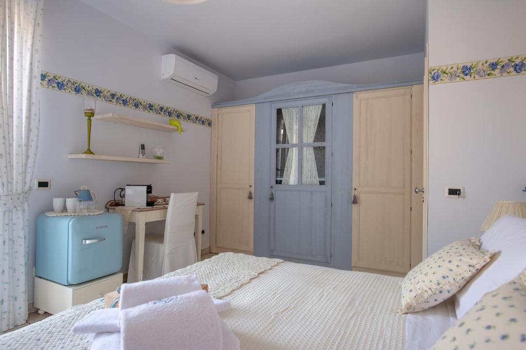 Postel nebo postele na pokoji v ubytování B&B at DurruEli's