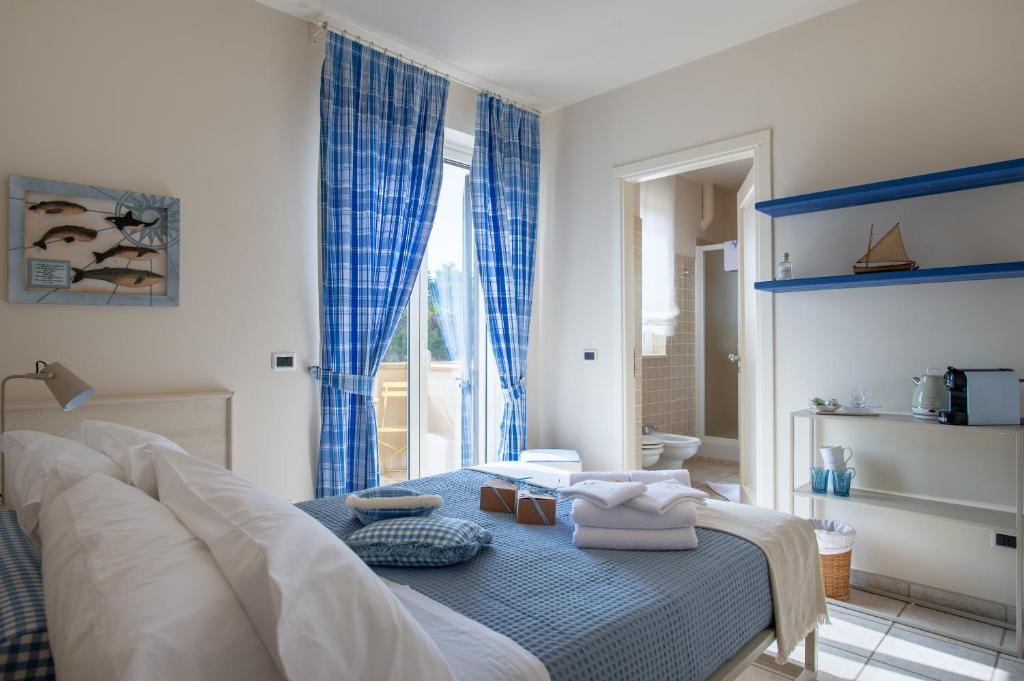 Postel nebo postele na pokoji v ubytování B&B at DurruEli's