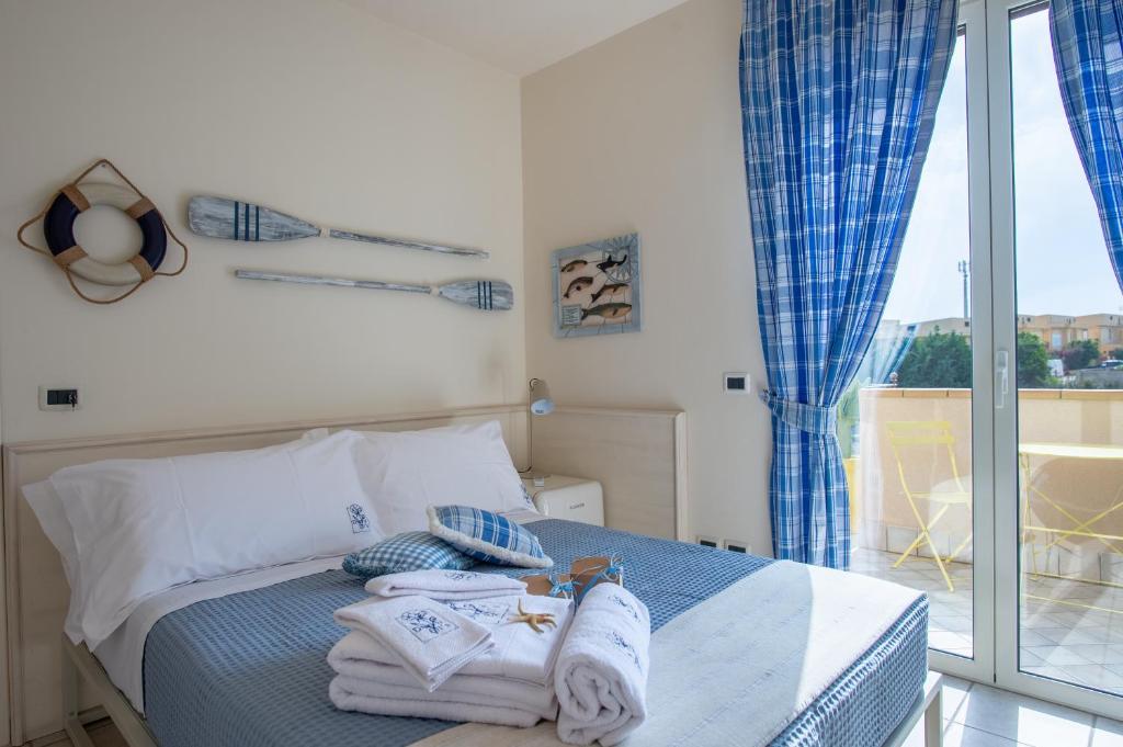 Postel nebo postele na pokoji v ubytování B&B at DurruEli's