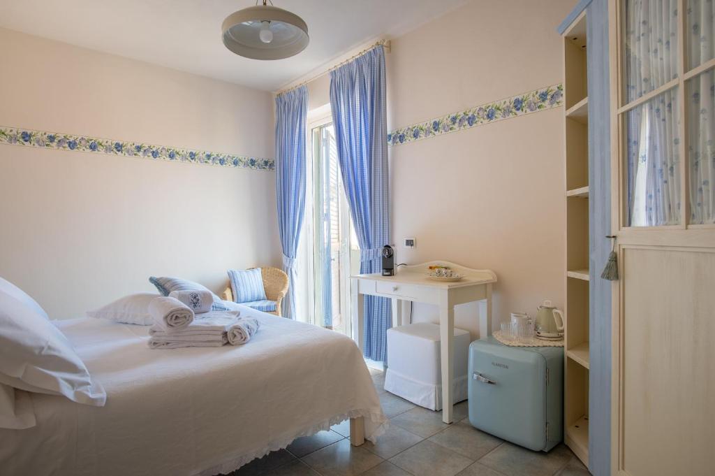 Postel nebo postele na pokoji v ubytování B&B at DurruEli's