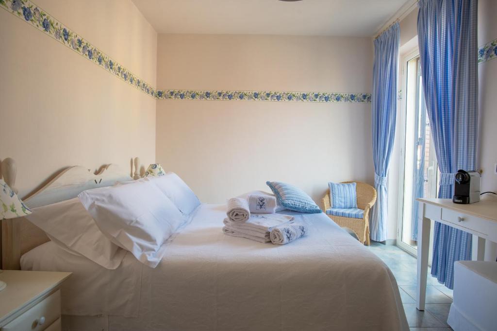 Postel nebo postele na pokoji v ubytování B&B at DurruEli's