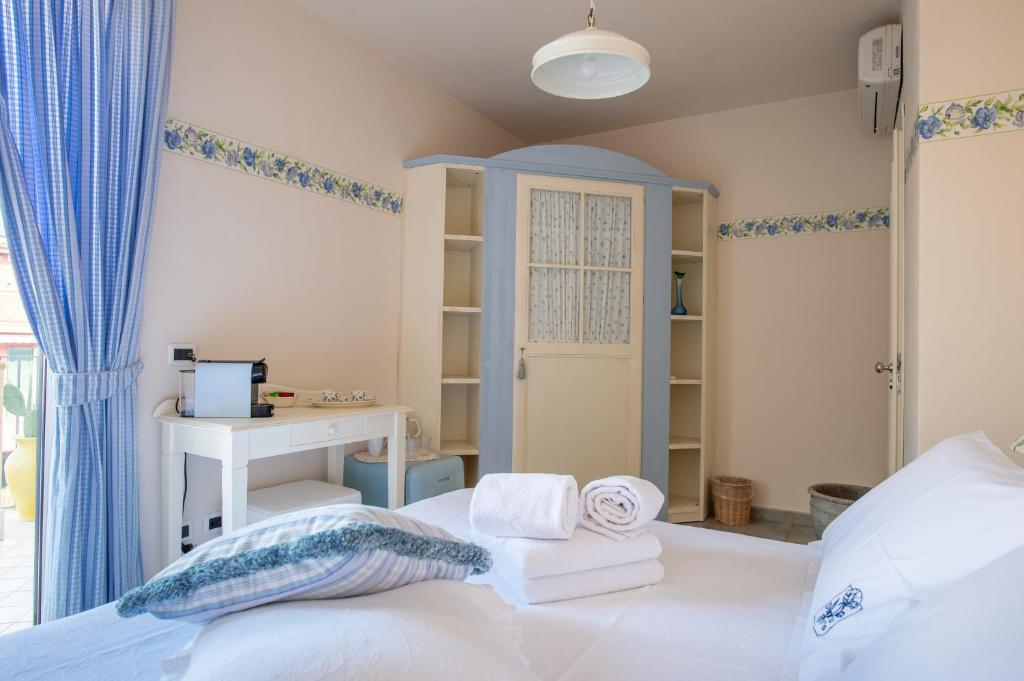 Postel nebo postele na pokoji v ubytování B&B at DurruEli's