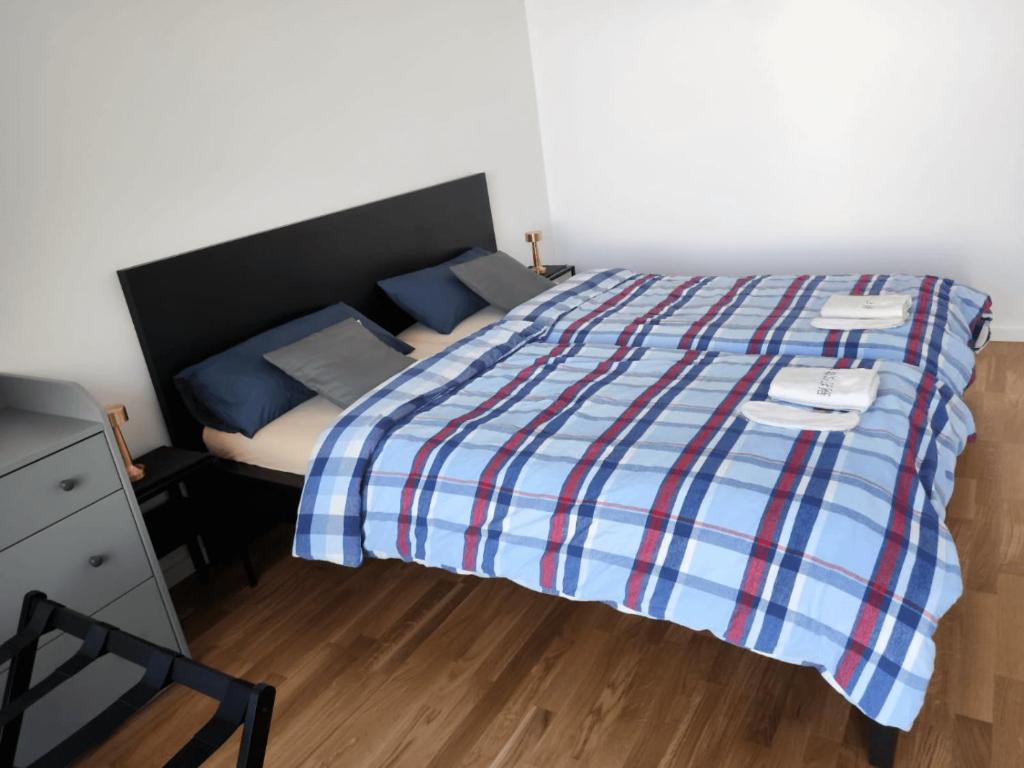 A bed or beds in a room at Moderne Wohnung mit Loggia - Neubau 2023