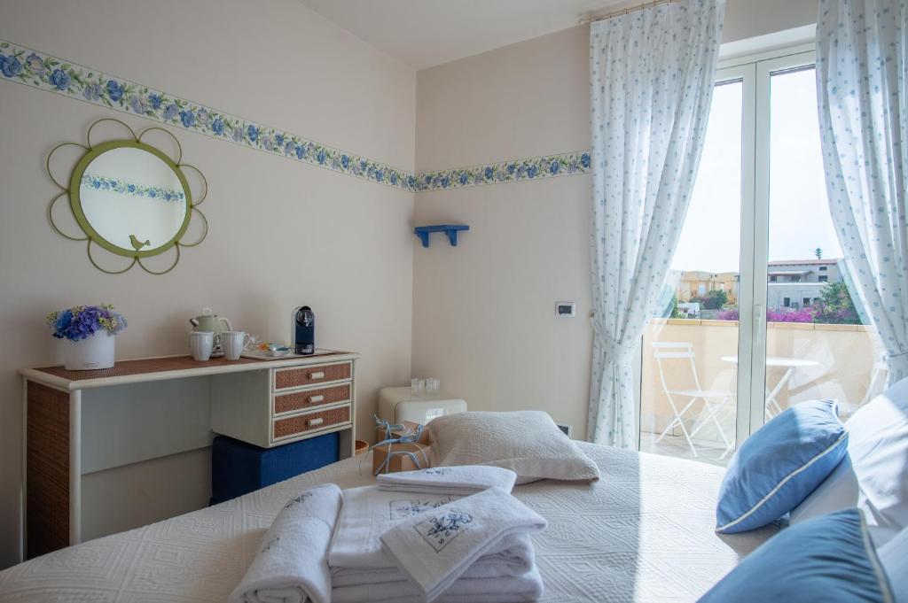 Postel nebo postele na pokoji v ubytování B&B at DurruEli's