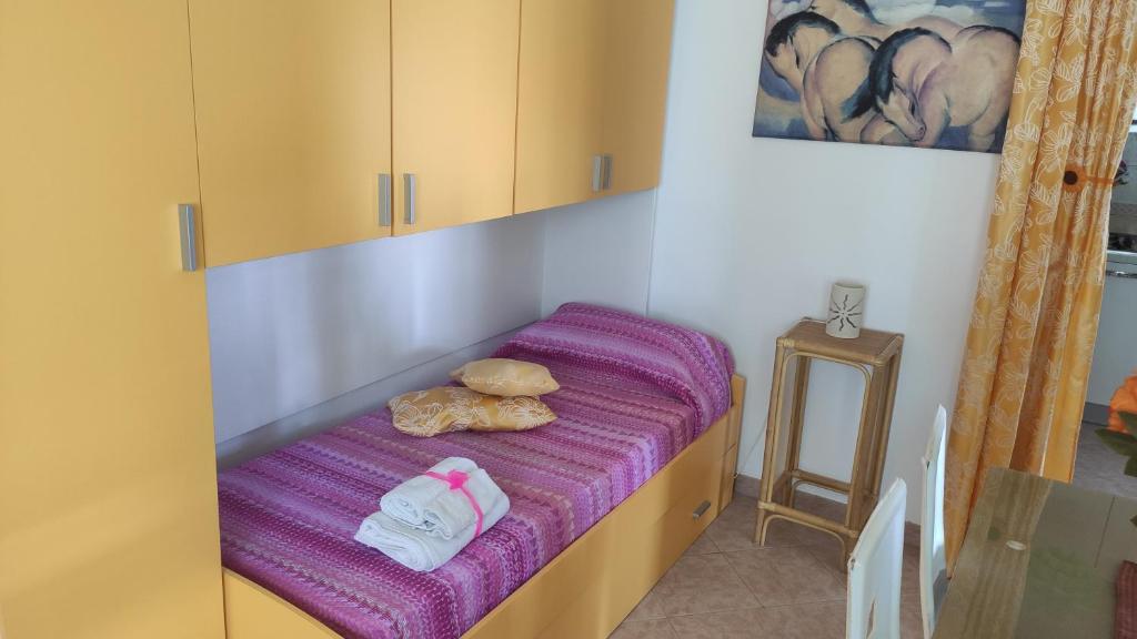 Postel nebo postele na pokoji v ubytování Casa Fronte Mare