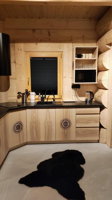 Kuchyňa alebo kuchynka v ubytovaní Wood House