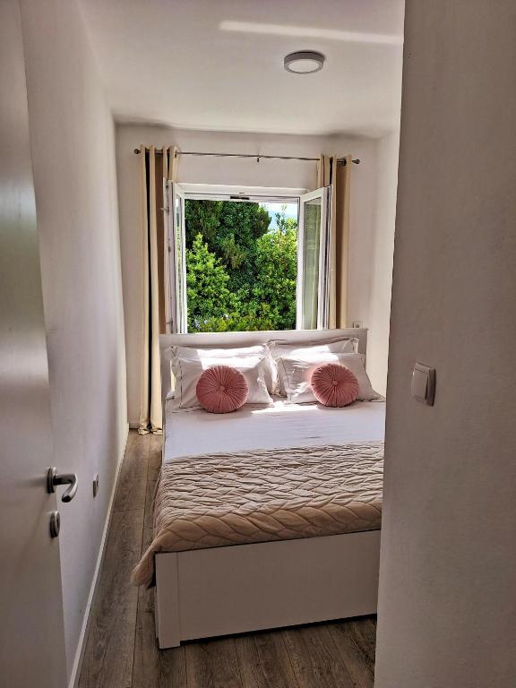 Posteľ alebo postele v izbe v ubytovaní Apartment Ivy