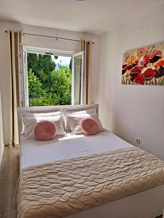 Posteľ alebo postele v izbe v ubytovaní Apartment Ivy