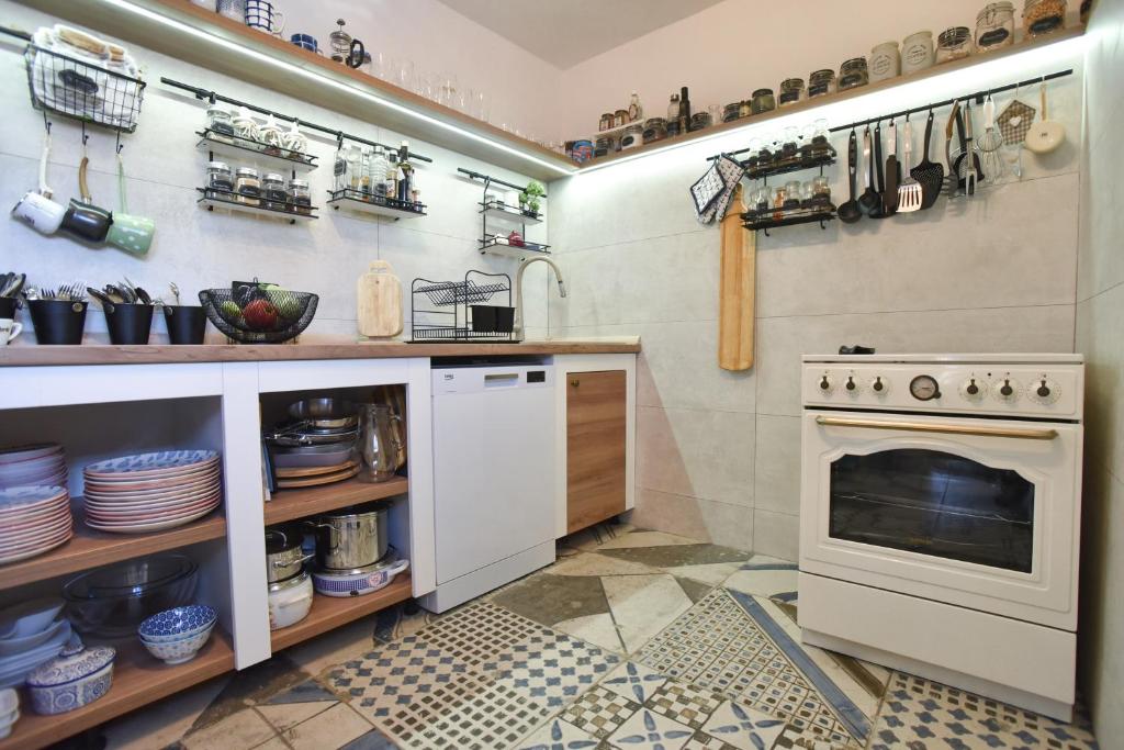 Kuchyň nebo kuchyňský kout v ubytování Villa Gioia
