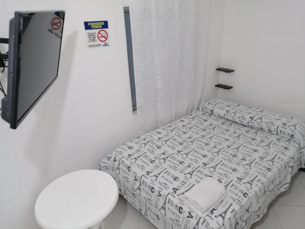Postel nebo postele na pokoji v ubytování HOTEL TANIA