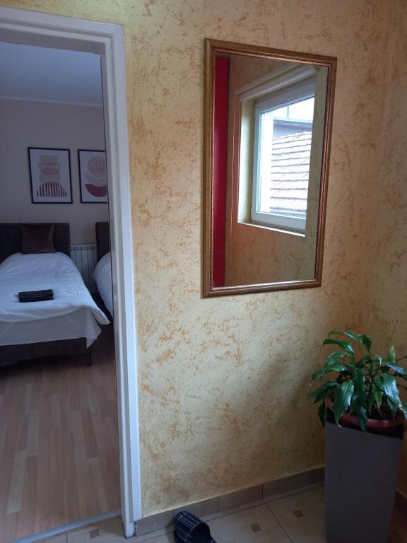 Letto o letti in una camera di LEDA Apartmani