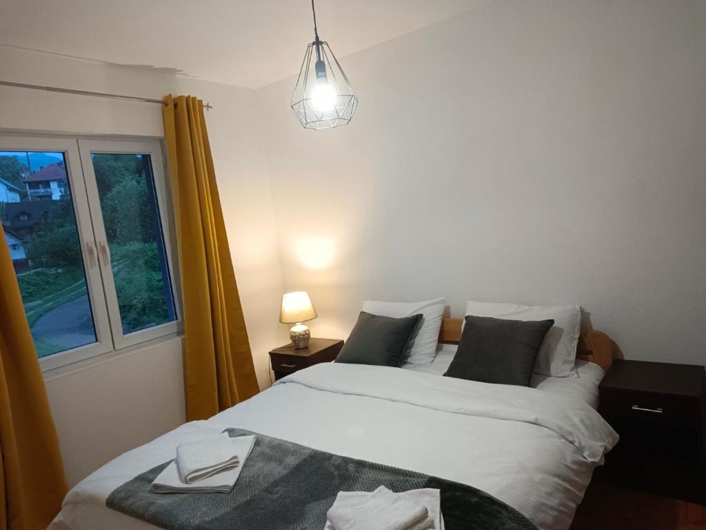 Postel nebo postele na pokoji v ubytování Apartman Irvas Kolasin