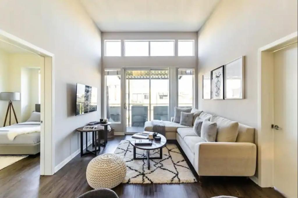 a living room with a couch and a bed at Luxury 2bedroom 2bath Santa Monica in Los Angeles