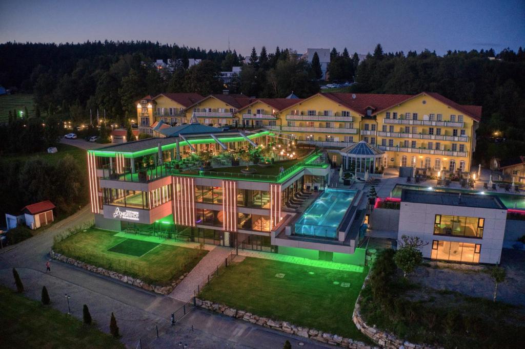 an aerial view of a large building with a swimming pool at Angerhof Sport- u. Wellnesshotel in Sankt Englmar