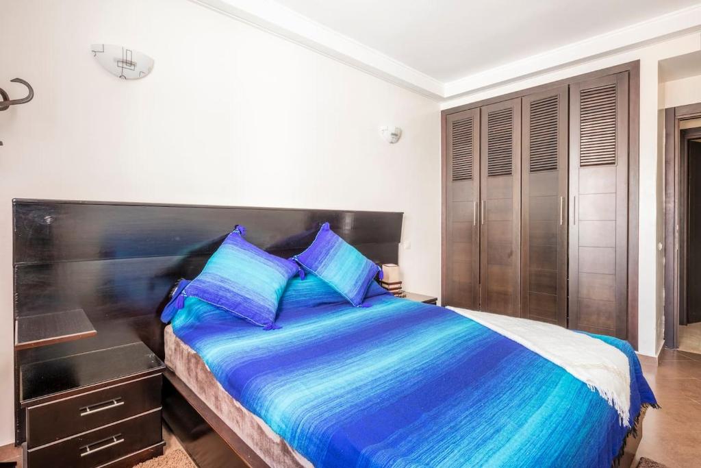 Postel nebo postele na pokoji v ubytování Apartment with parking in Rabat Central Location