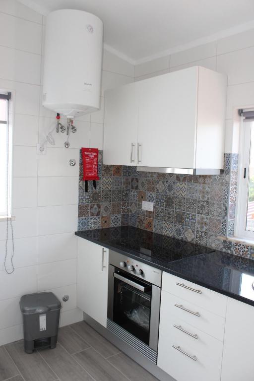 Kuchyň nebo kuchyňský kout v ubytování Casa Dom Simões