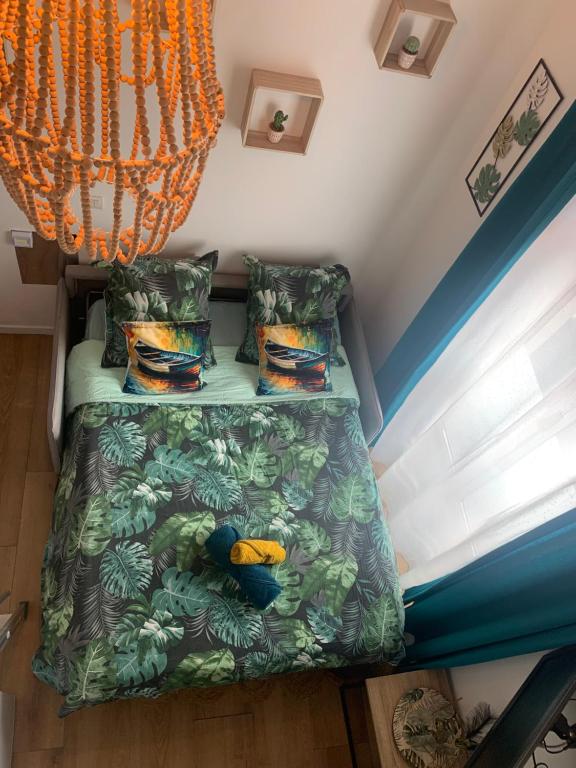 Posteľ alebo postele v izbe v ubytovaní Paris studio cosy climatisé