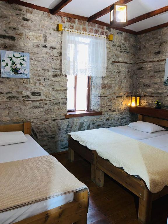 Voodi või voodid majutusasutuse Guest House and Hostel VAL-MAR toas