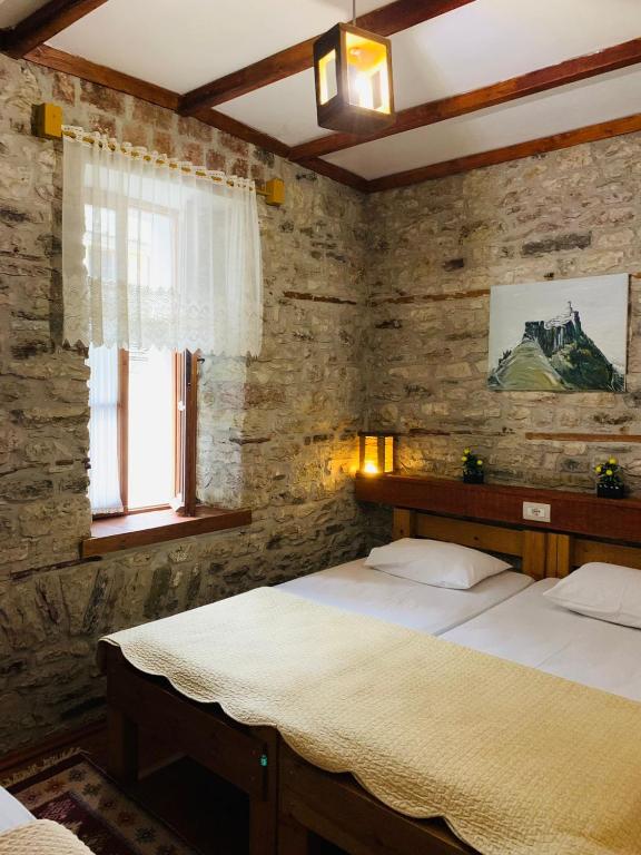 Voodi või voodid majutusasutuse Guest House and Hostel VAL-MAR toas