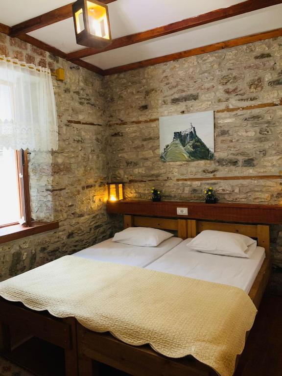 Voodi või voodid majutusasutuse Guest House and Hostel VAL-MAR toas