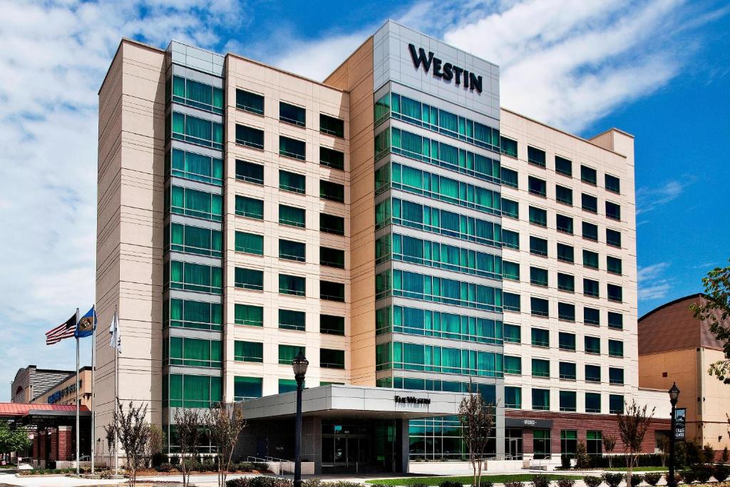 a building with a sign on the front of it at The Westin Wilmington in Wilmington