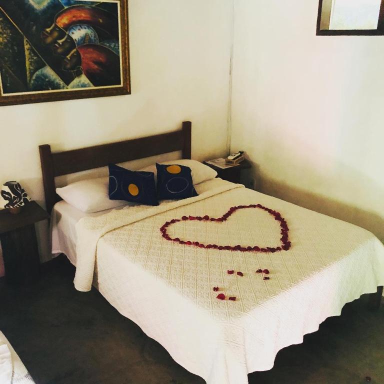 Postel nebo postele na pokoji v ubytování Pousada Estalagem Paraty