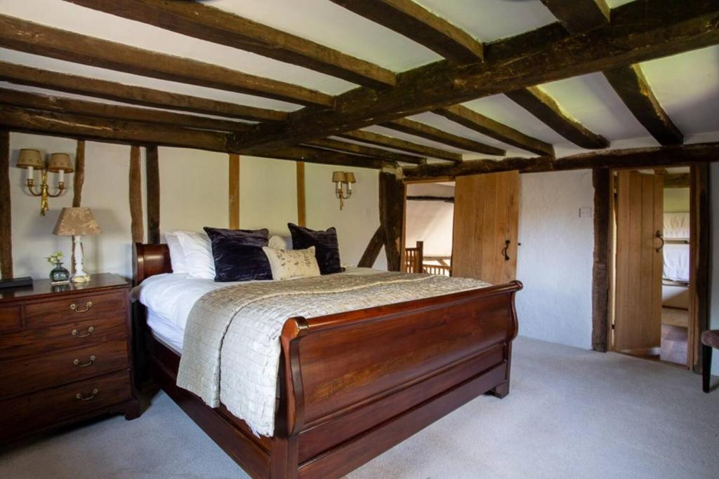 Postel nebo postele na pokoji v ubytování Swallowfield Farm