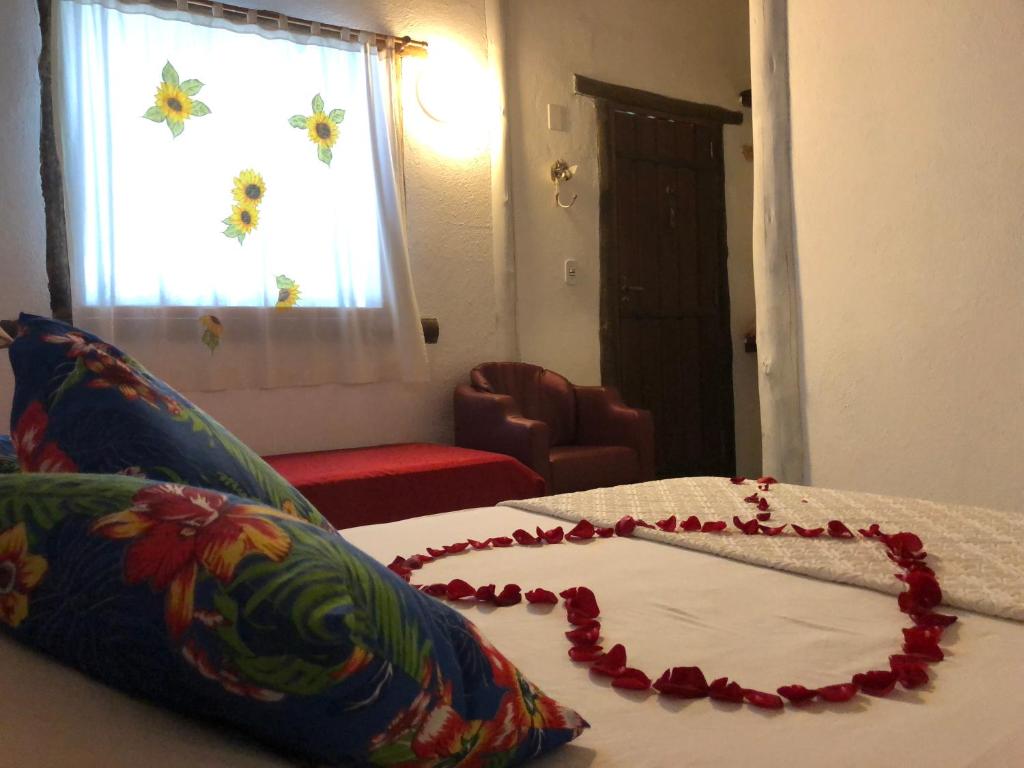 Postel nebo postele na pokoji v ubytování Pousada Estalagem Paraty