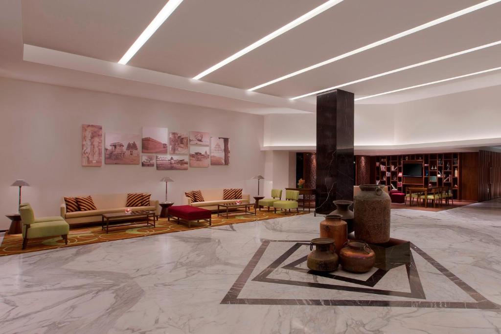 Posezení v ubytování Four Points by Sheraton Bengaluru Whitefield