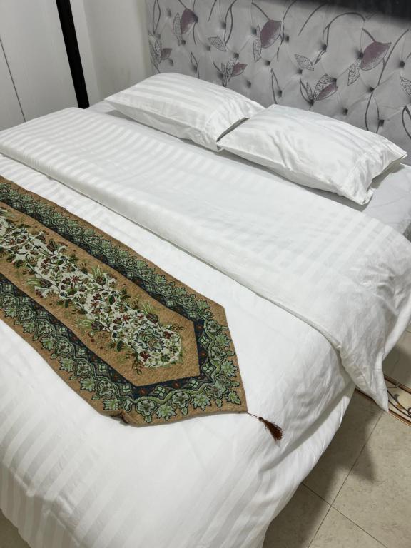 Voodi või voodid majutusasutuse ضيافة الأمير The Prince Hospitality toas