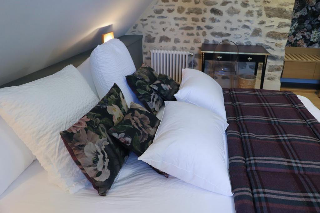 Postel nebo postele na pokoji v ubytování Les Deux Marguerite
