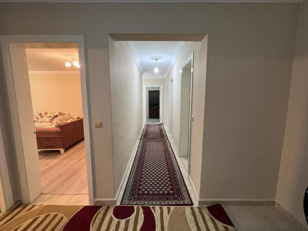 a hallway with a carpeted floor in a house at Paradice App in Istanbul