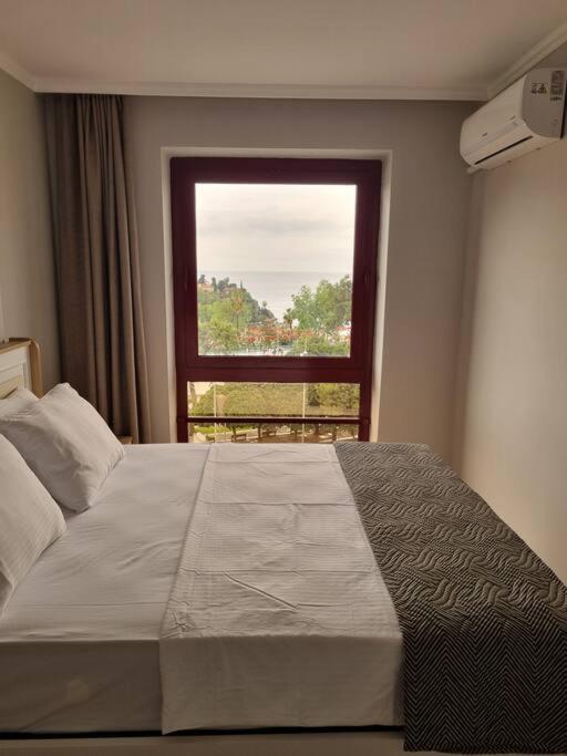 Postel nebo postele na pokoji v ubytování Royal Homes 403