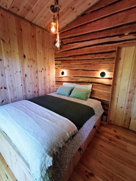 Postel nebo postele na pokoji v ubytování La Cabane d'Ode