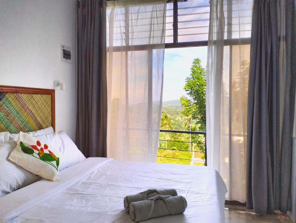 Postel nebo postele na pokoji v ubytování Las Terrazas de Barili Private Resort