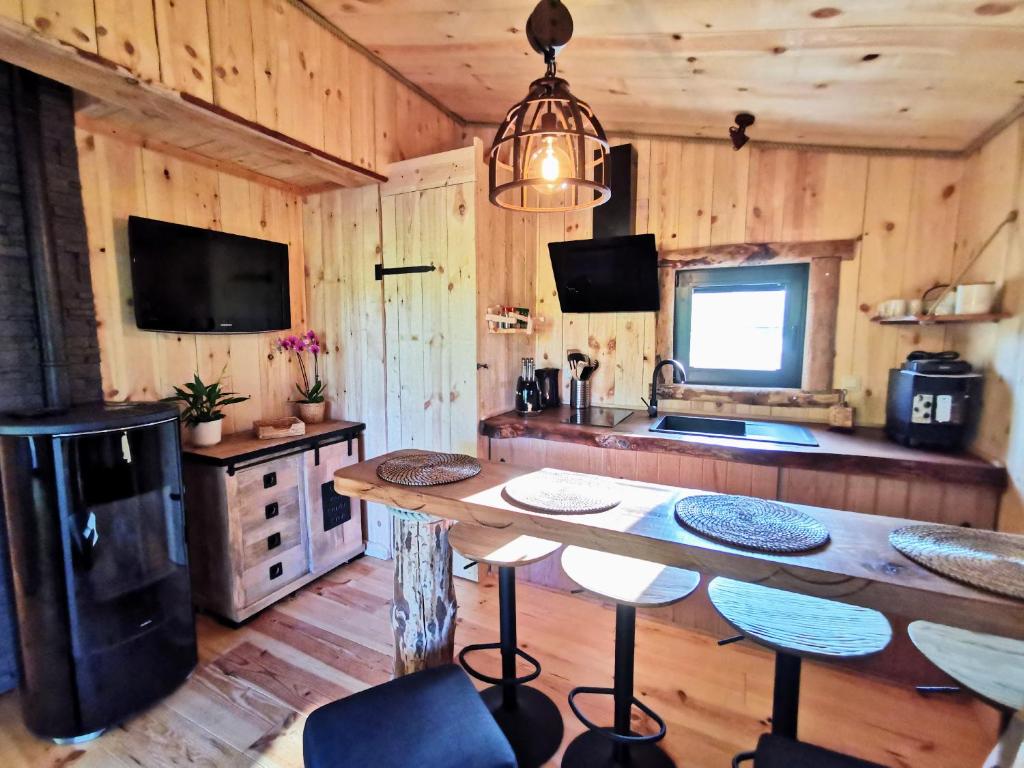 Kuchyň nebo kuchyňský kout v ubytování La Cabane d'Ode